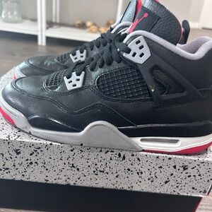 Jordan Air 4 Retro Black and Red Sneakers